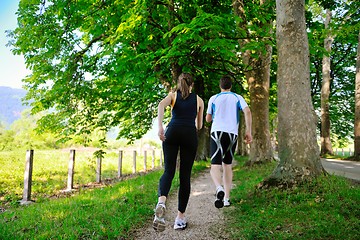 Image showing Young couple jogging