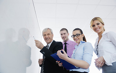 Image showing Senior business man giving a presentation