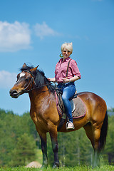 Image showing happy woman  on  horse