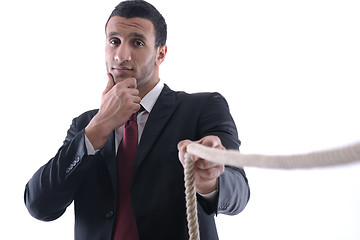 Image showing business man with rope isolated on white background