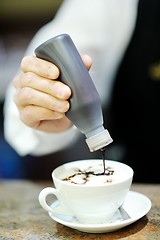 Image showing Barista prepares cappuccino