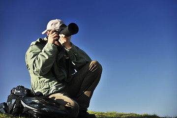 Image showing Nature photographer with digital camera