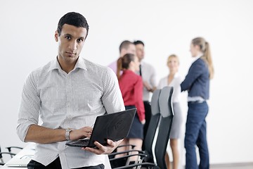 Image showing young business man at meeting