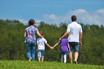 Image showing happy young family have fun outdoors