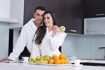 Image showing young couple have fun in modern kitchen