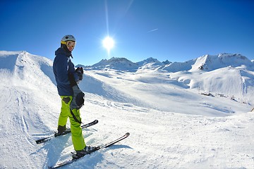 Image showing skiing on fresh snow at winter season at beautiful sunny day