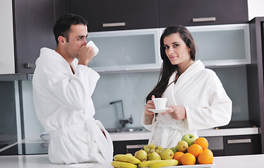 Image showing young couple have fun in modern kitchen