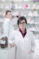 Image showing team of pharmacist chemist woman  in pharmacy drugstore