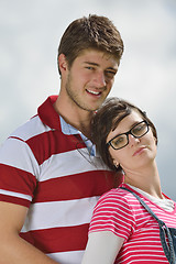 Image showing Portrait of romantic young couple smiling together outdoor