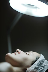 Image showing woman with facial mask in cosmetic studio