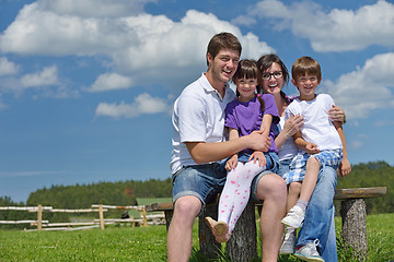 Image showing happy young family have fun outdoors