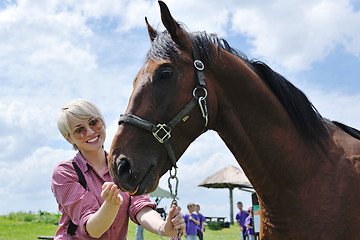 Image showing happy woman  on  horse