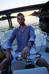 Image showing portrait of happy young man on boat