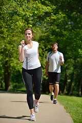 Image showing Young couple jogging at morning