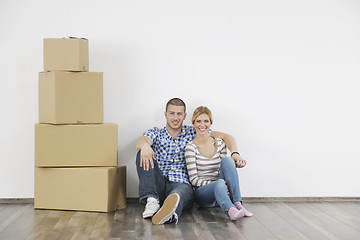 Image showing Young couple moving in new home