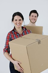 Image showing Young couple moving in new house