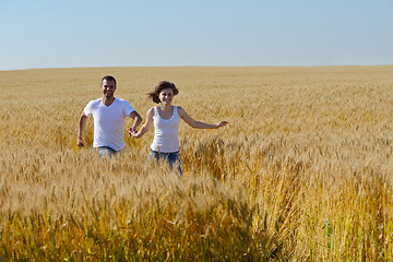 Image showing happy couple in wheat field