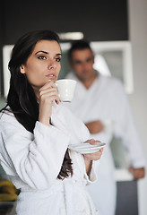 Image showing Young love couple taking fresh morning cup of coffee