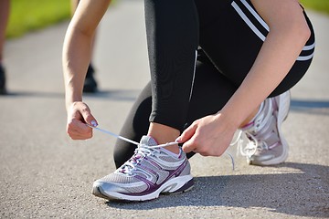 Image showing Young beautiful  woman jogging at morning in park