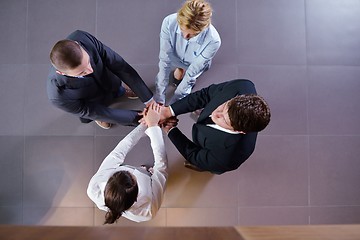 Image showing business people group joining hands