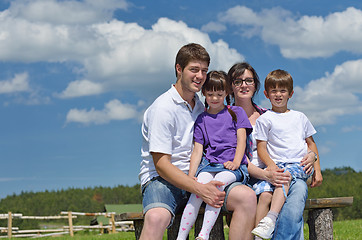 Image showing happy young family have fun outdoors