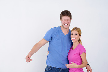 Image showing happy couple paint wall at new home