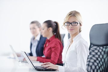 Image showing business woman group with headphones