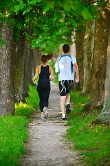 Image showing Young couple jogging