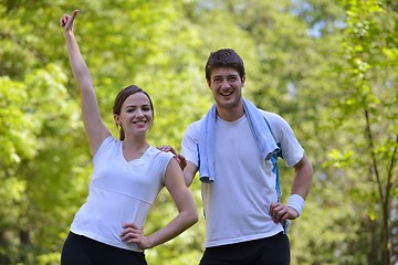 Image showing Young couple jogging