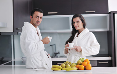 Image showing young couple have fun in modern kitchen