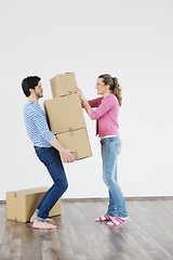 Image showing Young couple moving in new home