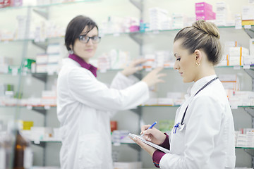 Image showing team of pharmacist chemist woman  in pharmacy drugstore