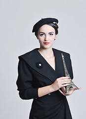 Image showing beautiful young woman with paris symbol eiffel tower