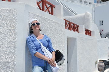 Image showing Greek woman on the streets of Oia, Santorini, Greece