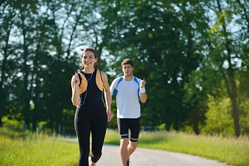 Image showing Young couple jogging at morning