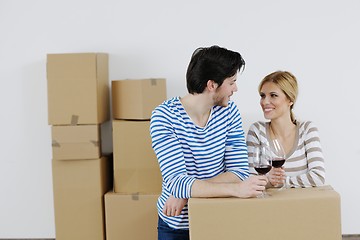 Image showing Young couple moving in new house