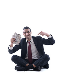 Image showing Business man holding money