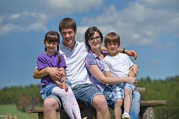 Image showing happy young family have fun outdoors