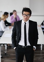 Image showing young business man at meeting