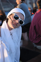 Image showing Greek woman on the streets of Oia, Santorini, Greece