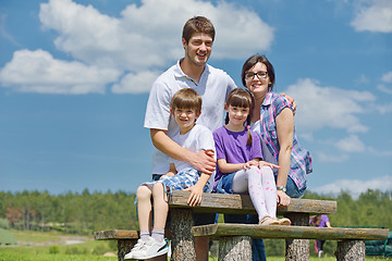 Image showing happy young family have fun outdoors