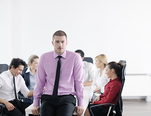 Image showing young business man at meeting