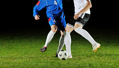 Image showing football players in action for the ball