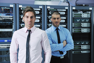 Image showing it enineers in network server room