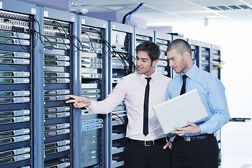 Image showing it enineers in network server room