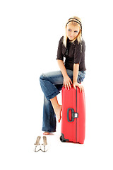 Image showing lovely blond with red suitcase