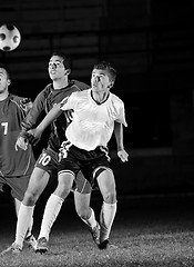 Image showing football players in action for the ball