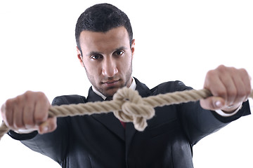 Image showing business man with rope isolated on white background