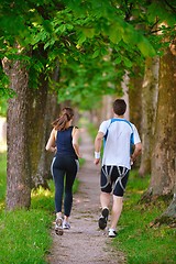 Image showing Young couple jogging