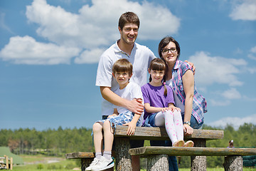 Image showing happy young family have fun outdoors